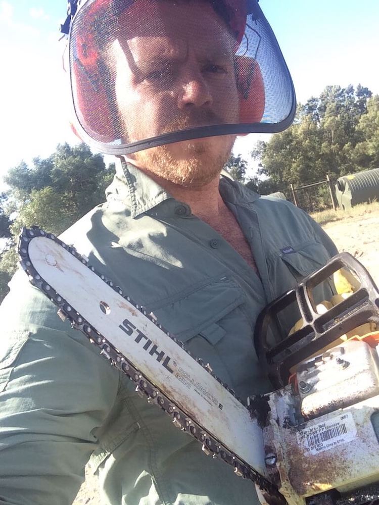 Chris with a chainsaw