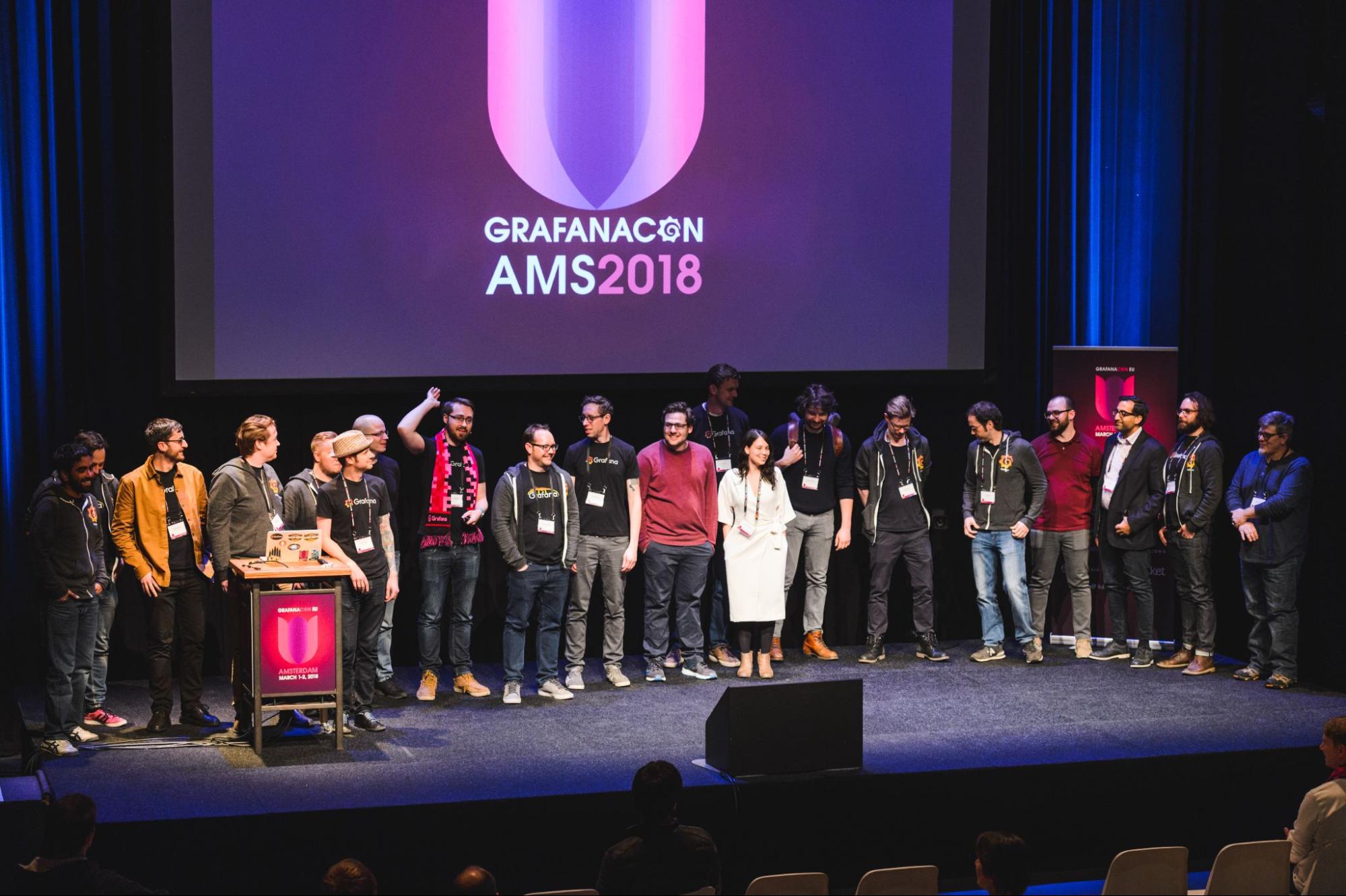 Photo of Grafana Labs team on stage at GrafanaCON 2018 in Amsterdam.