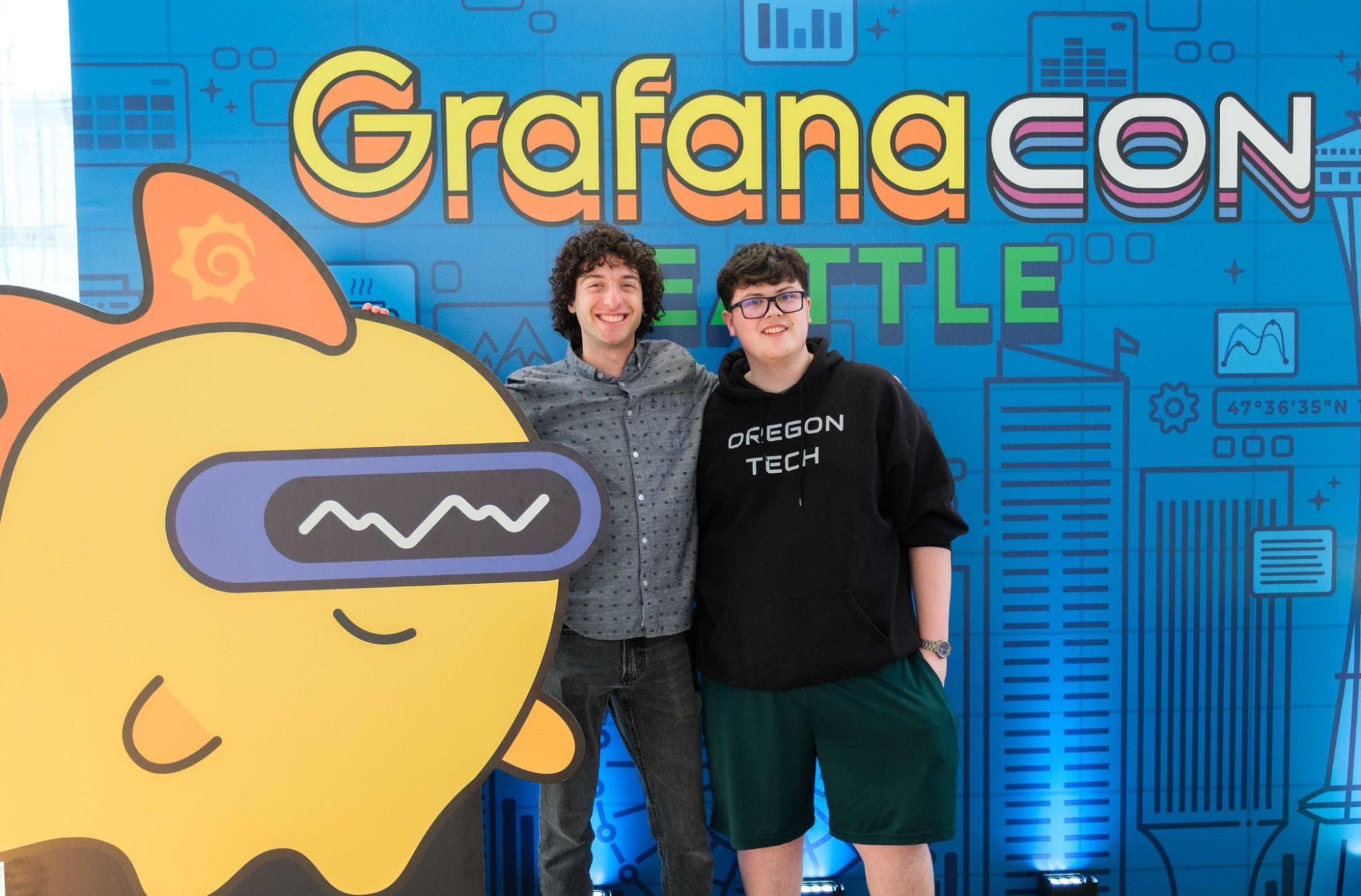 A photo of Dakota Roth and Cole Bentley at GrafanaCON 2025.