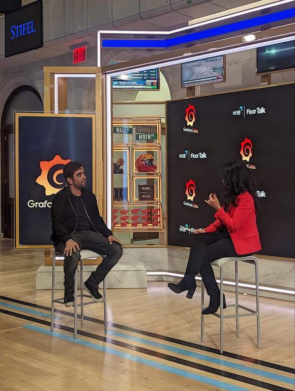 A picture of Grafana Labs CEO and Co-founder Raj Dutt talking with Judy Khan Shaw, host of NYSE Floor Talk.